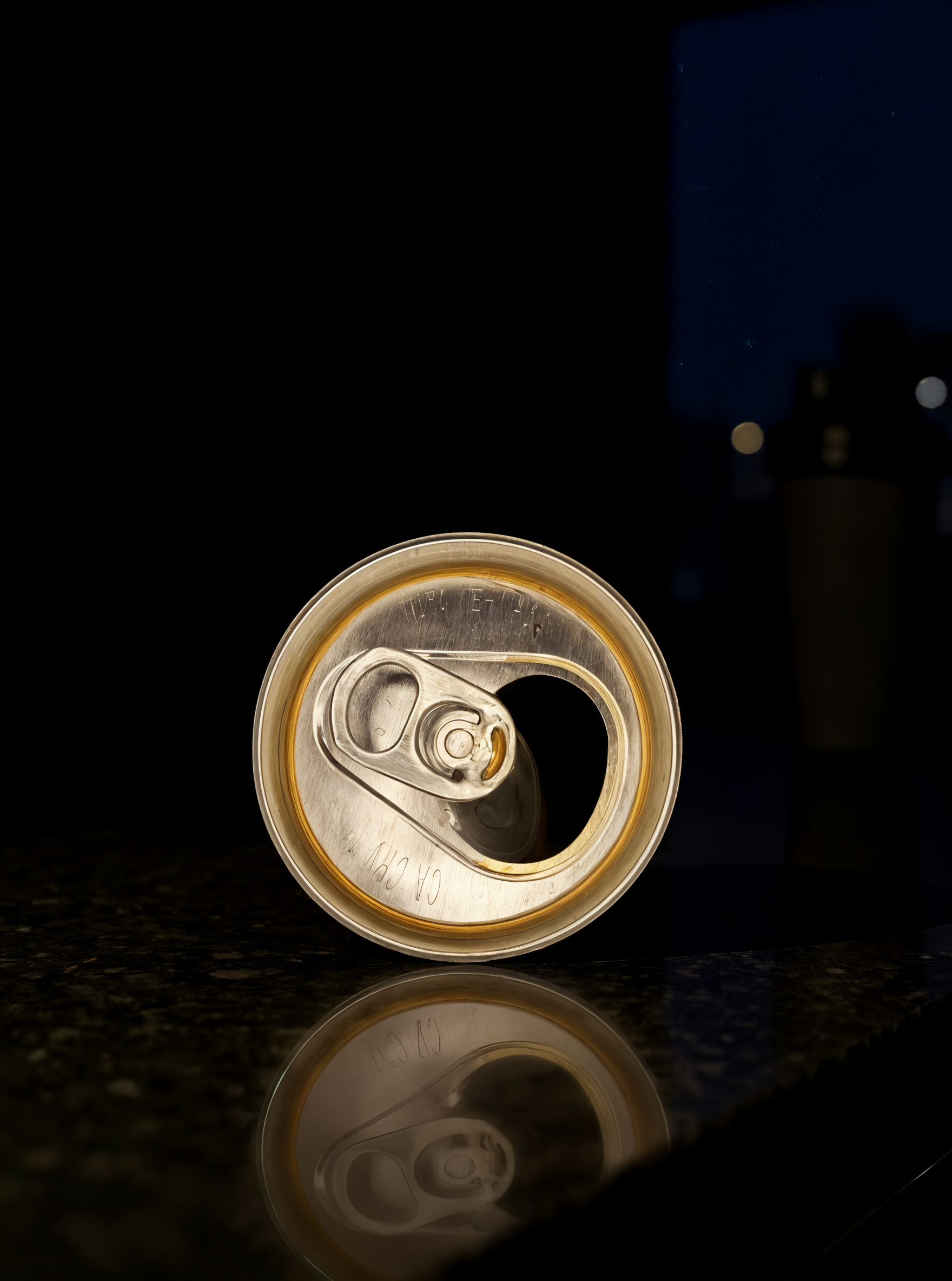 Bare Brew Cold Brew Coffee top-down can shot on dark reflective surface